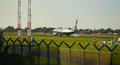 Dubli, Ireland - 10.11.2021: Ryanair airplane on the Dublin airport. Commercial airplane jetliner landing in beautiful sunset ligh Royalty Free Stock Photo