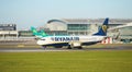 Dubli, Ireland - 10.11.2021: Ryanair airplane on the Dublin airport. Commercial airplane jetliner landing in beautiful sunset ligh Royalty Free Stock Photo