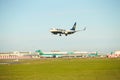 Dubli, Ireland - 10.11.2021: Ryanair airplane on the Dublin airport. Commercial airplane jetliner landing in beautiful sunset ligh Royalty Free Stock Photo