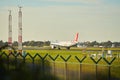 Dubli, Ireland - 10.11.2021: Turkish Airlines on the Dublin airport. Commercial airplane jetliner landing in beautiful sunset ligh Royalty Free Stock Photo