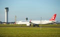 Dubli, Ireland - 10.11.2021: Turkish Airlines on the Dublin airport. Commercial airplane jetliner landing in beautiful sunset ligh Royalty Free Stock Photo