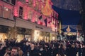 Dublin city, Ireland - 12.11.2021: Scene at Grafton street illuminated and decorated for Christmas. Huge crowd of people enjoy Royalty Free Stock Photo