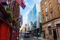 Dublin city, Ireland - 02.10.2021: Small street in Dublin city with old and new modern glass building. Mixing architecture style Royalty Free Stock Photo