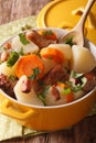 Dublin coddle of roughly sliced pork sausages and potatoes, onio Royalty Free Stock Photo