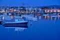 Beautiful early morning view of boats and yachts in West Pier of famous Dun Laoghaire harbor during blue hour before sunrise Royalty Free Stock Photo