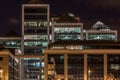 Modern exterior office building at night.