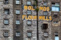 Closeup front facade view of the old abandoned in decay factory mill Bolands Flour Mills in Dublin Ireland.