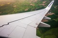 DUBLIN, IRELAND - APRIL 23, 2017: Ryanair logo in the wing of the airplane with sky as the background. Ryanair has cheap flights