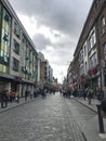 Dublin, Ireland - August 3, 2017: City street view and pedestrians in Dublin Ireland