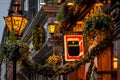 DUBLIN, IRELAND, DECEMBER 24, 2018: Close up of the exterior of the Palace Bar, decorated for Christmas on Fleet Street, with a Royalty Free Stock Photo