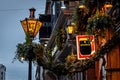 DUBLIN, IRELAND, DECEMBER 24, 2018: Close up of the exterior of the Palace Bar, decorated for Christmas on Fleet Street, with a