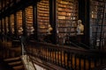 DUBLIN, IRELAND, DECEMBER 21, 2018: The Long Room in the Trinity College Library, home to The Book of Kells. Perspective view of Royalty Free Stock Photo