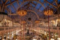 DUBLIN, IRELAND, DECEMBER 24, 2018: People shopping at Stephens Green Shopping Centre, decorated with Christmas lights, balls and Royalty Free Stock Photo