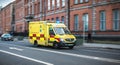 Irish ambulance driving fast on the streets of Dublin, Ireland