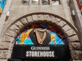 Dublin, Ireland - 07.12.2023: Guinness sign on a wall of a Guinness brewery and museum. Popular travel area and capital landmark