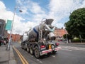 Dublin, Ireland - 07.12.2023: Huge concrete mixer in town center on a road. Renovation and modernization of Irish capital.