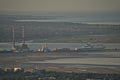 Beautiful closeup aerial view of Poolbeg CCGT chimneys, Pigeon House Power Station and Irish Ferries, Dublin, Ireland