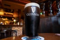 Pints of Guinness served at a pub in Dublin, Ireland Royalty Free Stock Photo