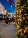 Dublin, Ireland - 20.12.2022: Lights on a fur tree decoration and Decorated and illuminated Grafton street in the Irish capital