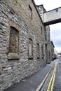 The stone walls of The Guinness Factory with cobbled streets. Dublin, Ireland. March 29, 2017.