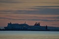 Beautiful early morning view of Stena Line ferry ship in Irish Sea near Poolbeg lighthouse seen from Blackrock beach