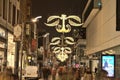 Dublin, Ireland - November 13, 2021: Beautiful view of festive Christmas lights and decorated Arnotts store on busy Henry Street