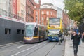 Dublin street with bus and tram of public transport in Dublin