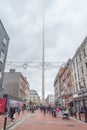 Pedestrian Earl street with Dublin spire