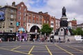 Bachelors Quay avenue and O`Connell monument in the city centre of Dublin