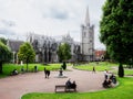 Dublin, Ireland - 07.12.2023: St Patrick\'s Cathedral and park. Warm cloudy day. Popular town landmark and church. St