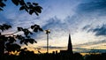 Dublin Skyline silhouette at sunset St. Laurence O`Toole church