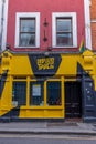 Dublin, a street view of closed Drop Dead Twice with gray and yellow colours