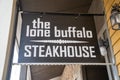 Dubois, Wyoming - July 26, 2020: Sign for the Lone Buffalo Steakhouse, a restaurant in downtown area