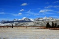 Dubois Wyoming Mountain Farming View of harvested Alfalfa field in front of the Absaroka Mountain Range