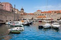 Dubrovnik city old port marina and fortifications in a beautiful early spring day Royalty Free Stock Photo