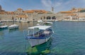 Dubrovnik old town harbor atmosphere with local small boats moored