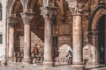 Dubrovnik, Croatia - Aug 20, 2020: Ancient Pillars of Rector's palace in old town center in summer