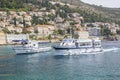 Panorama of Dubrovnik - view from sea with blue water of old town and harbor with yachts and