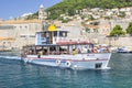 Panorama of Dubrovnik - view from sea with blue water of old town and harbor with yachts and