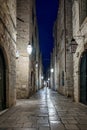 Dubrovnik, Croatia - Jun 20, 2020: Illuminated narrow street at night, the unesco world heritage of old town Dubrovnik