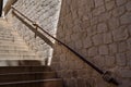 Dubrovnik, Croatia - Jun 21, 2020: Stone hand holding stairway railing in the Rectors Palace in Dubrovnik, Croatia Royalty Free Stock Photo