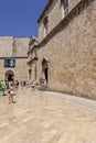 City Walls with entrance Pile Gate and St. Saviour Church located on Stradun street, Dubrovnik, Croatia Royalty Free Stock Photo