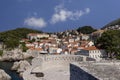 Bokar tower and Dubrovnik West Harbour at picturesque bay with a stone pier by the Adriatic Sea, Dubrovnik, Croatia Royalty Free Stock Photo