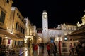 Dubrovnik, Croatia - 04 May 2018: The clocl tower on Stradun street at night in Dubrovnik city on Adriatic sea, Croatia