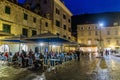 DUBROVNIK, CROATIA - MAY 31, 2019: Evening view of an open air restaurant in the old town of Dubrovnik, Croat Royalty Free Stock Photo