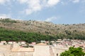 Dubrovnik old town city view, old castle view, Ancient fortress view and houses, a castle on the sea bay, hand made walls build wi Royalty Free Stock Photo