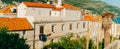 Dubrovnik Old Town, Croatia. Tiled roofs of houses. Church in th Royalty Free Stock Photo