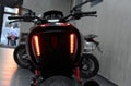 Ducati Diavel Carbon motorcycle. Close-up of the lit lanterns. Royalty Free Stock Photo