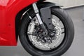 Ducati Panigale 959 motorcycle: Close-up of the wheel, fairing red color