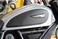 Ducati Scrambler: Close-up of fuel tank, gray and black, custom motorcycle